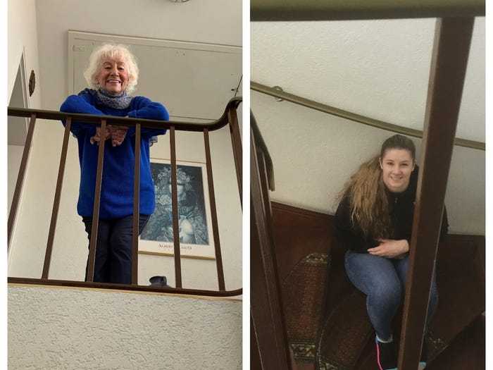 Social distancing photo gallery - elderly and teenager speaking through staircase