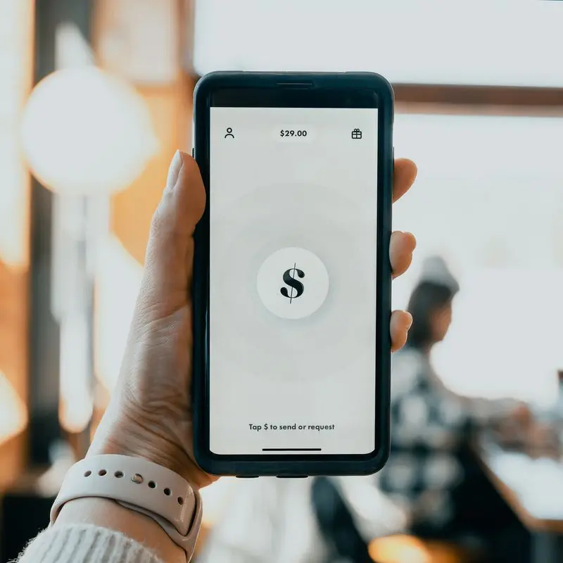 geofencing marketing hand holding phone