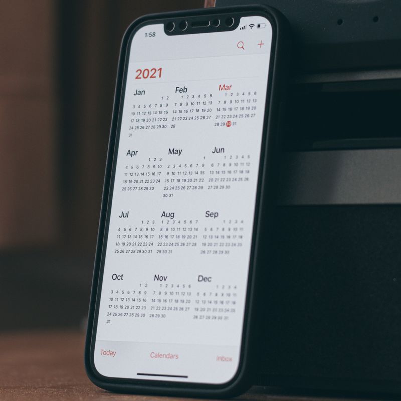 trading online voucher august 2021 mobile phone showing 2021 calendar
